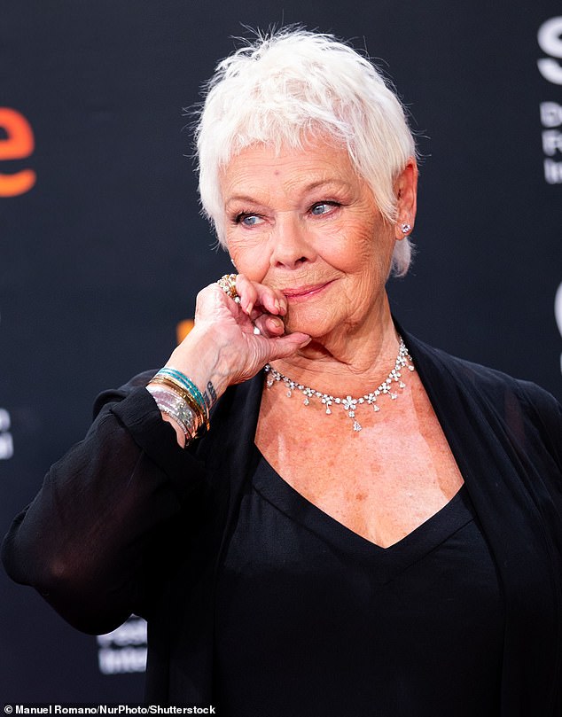 Dame Judi Dench, 89, is one of the first two female members admitted to the Garrick Club, which was previously only open to men.