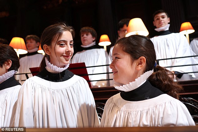 After 900 years of activity, girls will join the choir at St Paul's Cathedral for the first time. Pictured are Lila and Lois, aged 11 and 10.