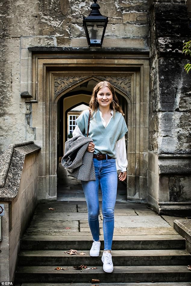 Princess Elizabeth looks cheerful as she walks down the stairs at Oxford University in 2021