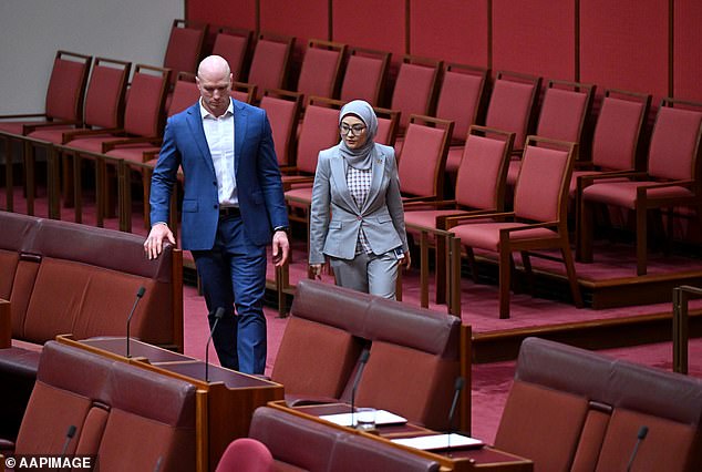 Fatima Payman (right) clashes with independent MP David Pocock (left) during a Greens motion on Palestine