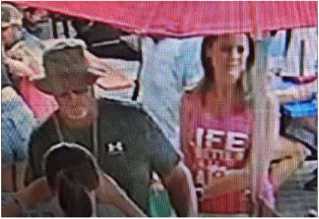 One of the participants, the man seen on the left, is apparently cooperating with police, who say he is not believed to be a suspect. The woman to his right was also being sought but had not been located as of Thursday, police said.