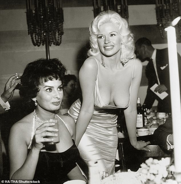 According to PEOPLE, she responded to the online backlash by again turning an iconic 1957 photo of Sophia Loren leering at a busty Jayne Mansfield into a now-deleted meme; Loren and Mansfield were seen in a similar image.