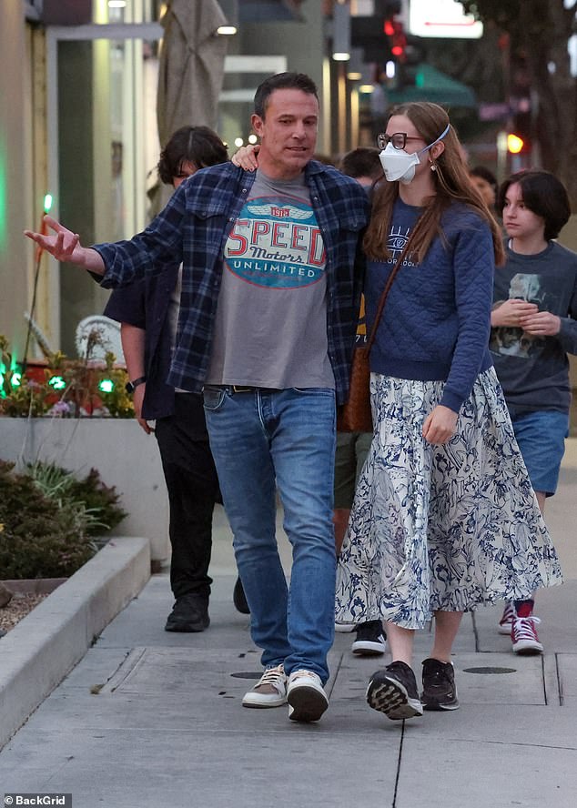 The actor wore a casual checked shirt, grey T-shirt and jeans, while Violet opted for a navy jumper and a white and blue printed skirt.