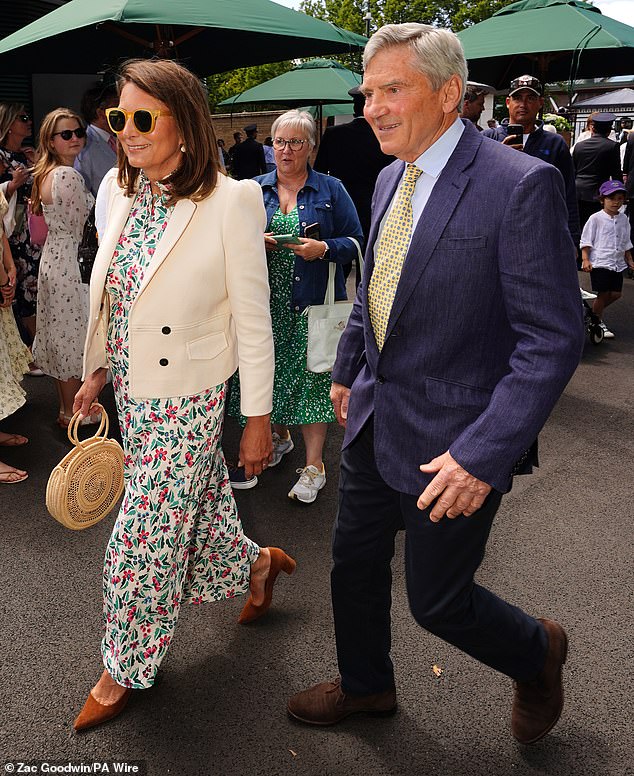 For today's outing, mother-of-three Carole was the picture of elegance in a white, green and pink floral dress.