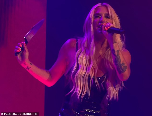 And the star put on a great performance, as she brandished a large knife on stage and sang her new single.