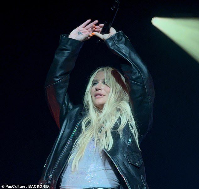 Later in the evening, Kesha opted to bundle up a bit more and sported a black leather jacket.