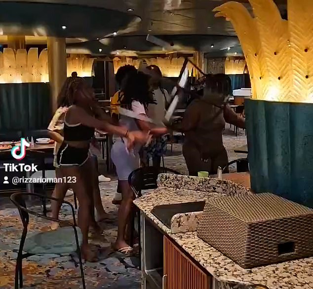 Chairs flew in the fight, which took place in the dining room of a Carnival cruise ship.