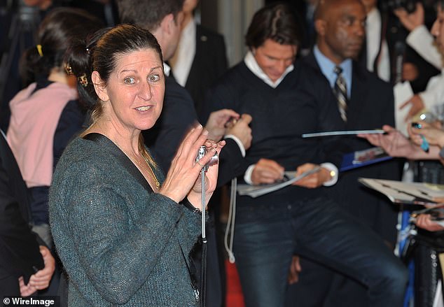 Tom's former publicist Lee Anne DeVette is seen taking photos at the Japanese premiere of Knight and Day in 2010.