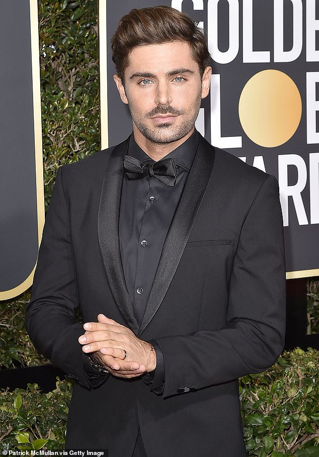 Efron pictured at the Golden Globes in January 2018, three years before his downfall.