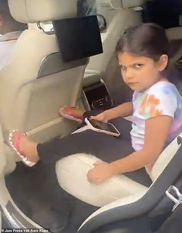 ANGRY: Amir's daughter Alayna (pictured) didn't seem too happy about her dad leaving her in the car.