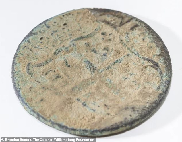 A 250-year-old Virginia halfpenny was also found in the ground.