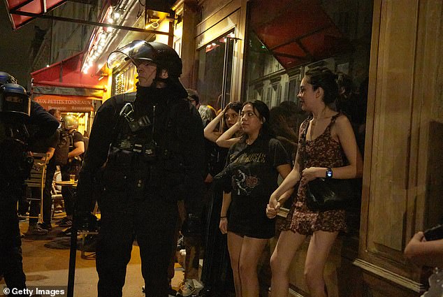 Young women trying to enjoy a night out in the city were forced to stay behind armed police.