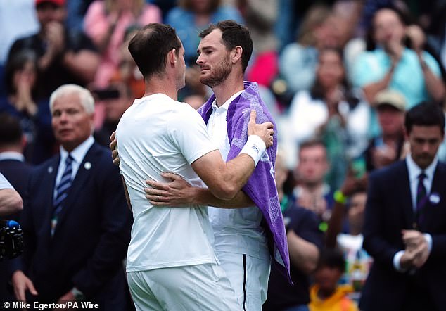 Murray shared a warm hug with his brother Jamie after his defeat in the men's doubles event.