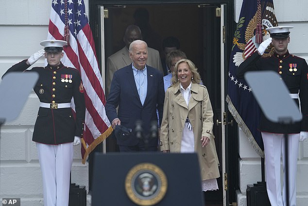 President Joe Biden (left) and First Lady Jill Biden (right) arrive on the South Lawn for the first of two appearances commemorating the Fourth of July