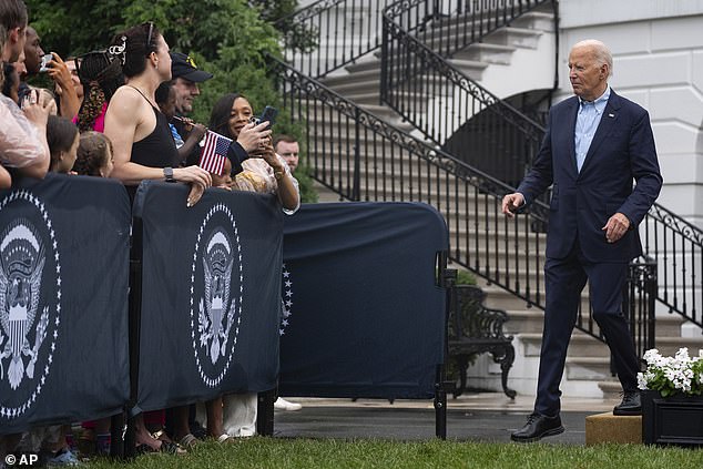 President Joe Biden addresses attendees during Thursday night's Fourth of July picnic for military families.