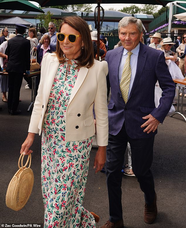 Carole Middleton looked elegant as she arrived at the tennis event in a floral dress alongside her husband, Michael Middleton.