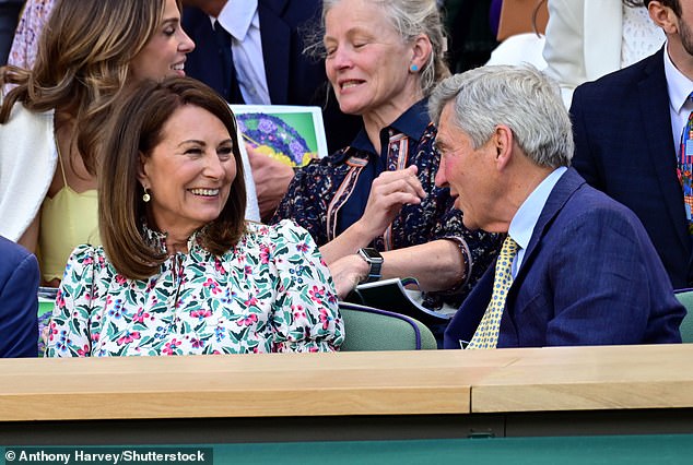 Carole, 69, and Michael, 75, looked cheerful as they watched the tennis tournament from the Royal Box.