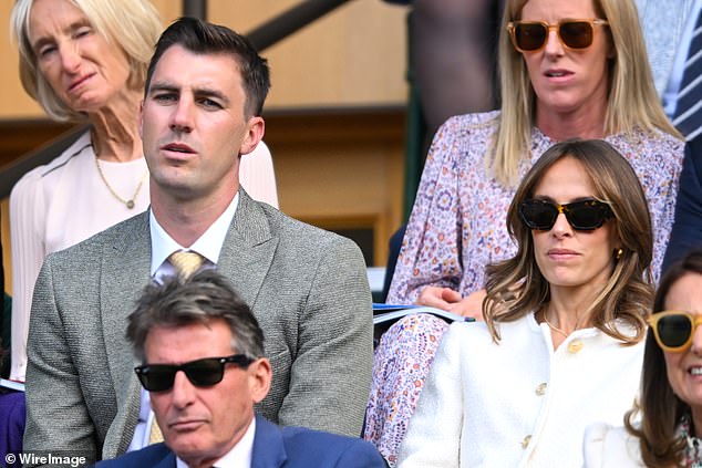 The 31-year-old sat next to his glamorous wife, Becky, who wore a white blazer with striking gold buttons for the event.