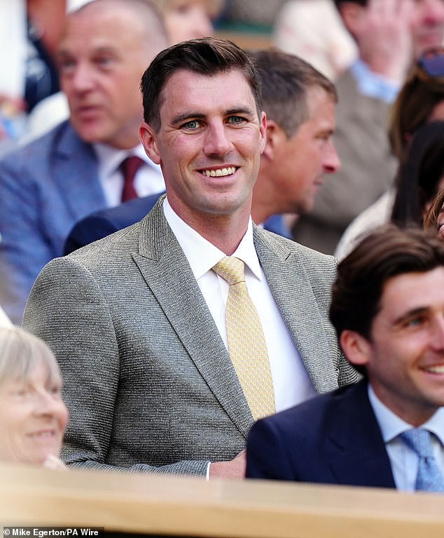 Despite the disappointment of Australia's elimination from the T20 World Cup, the Test captain was all smiles as he watched Novak Djokovic win on Centre Court.