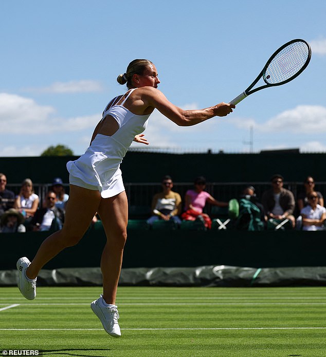 The sleeveless, plunging V-neckline, open-back gown is an almost exact replica of her wedding dress, with the same elegance and grace but tailored for athletic performance.