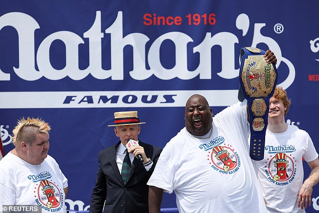 Booker, who drinks soda on YouTube, was awarded a belt for his victory, as fighters do after a fight.