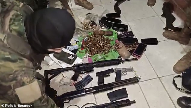 Ecuadorian troops reveal the cache of weapons they found and collected