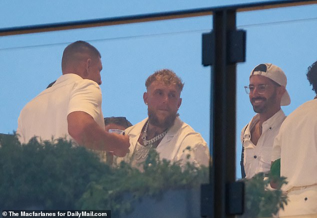 Once inside, Paul was seen talking to Gronkowski as they continued to enjoy their evening.