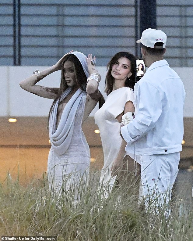 Among them was Emily Ratajkowski, seen here downtown, arriving with her friend Winnie Harlow before sunset.