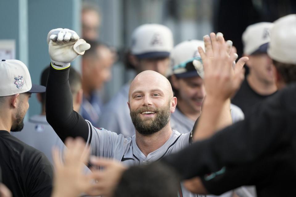 Arizona's Christian Walker celebrates after hitting a two-run home run during the third inning on Thursday.