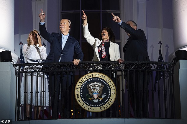 Later, during the evening fireworks, Biden stood on the balcony with his family, Harris and her husband, Doug Emhoff, in a clear show of support.