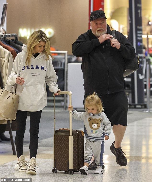 Otto looked adorable in a grey and navy tracksuit that featured a bear printed on the front of his sweatshirt.