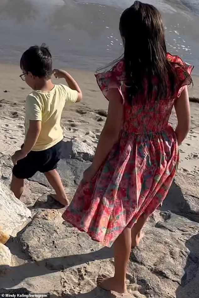 Little Katherine and Spencer were photographed playing with their toys in the backyard, then seen on video running around on rocks at the beach.