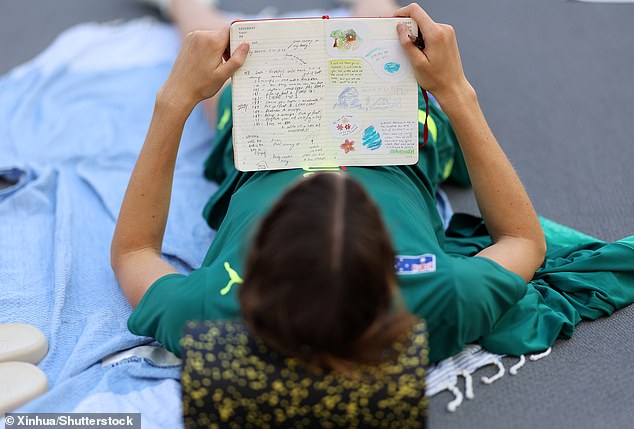 Olyslagers and his 'little golden book' in which he writes about jumping, training and adds small drawings along with biblical quotes.