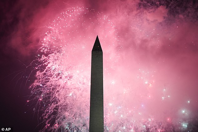 Fireworks explode on the National Mall above the Lincoln Memorial in Washington DC