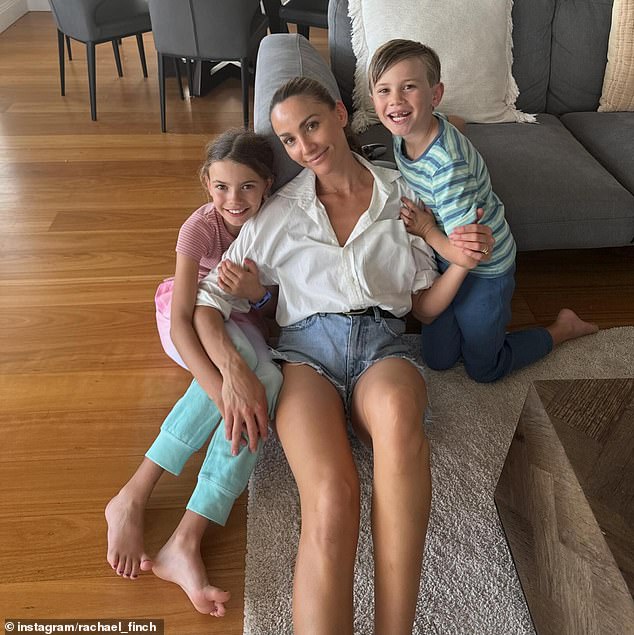 Rachael Finch has put her young children, Violet, 8, and Dominic, 5, to work in her health supplements factory during the school holidays. All pictured