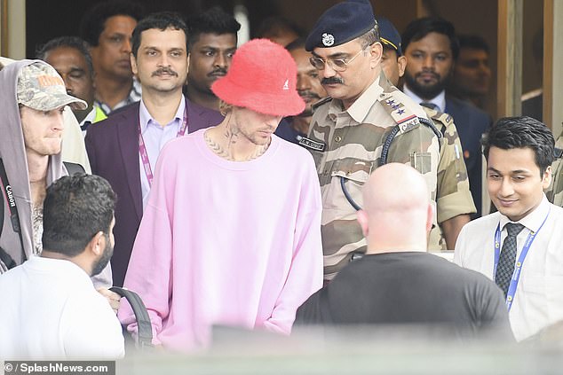 The Baby singer, 30, who is set to welcome his first child later this year with his aging Hailey, put on a colourful display as he stepped out in a pink sweater.