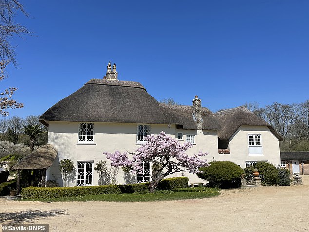 The Grade II listed, five-bedroom thatched cottage near Dorchester is set in 1.67-acre gardens