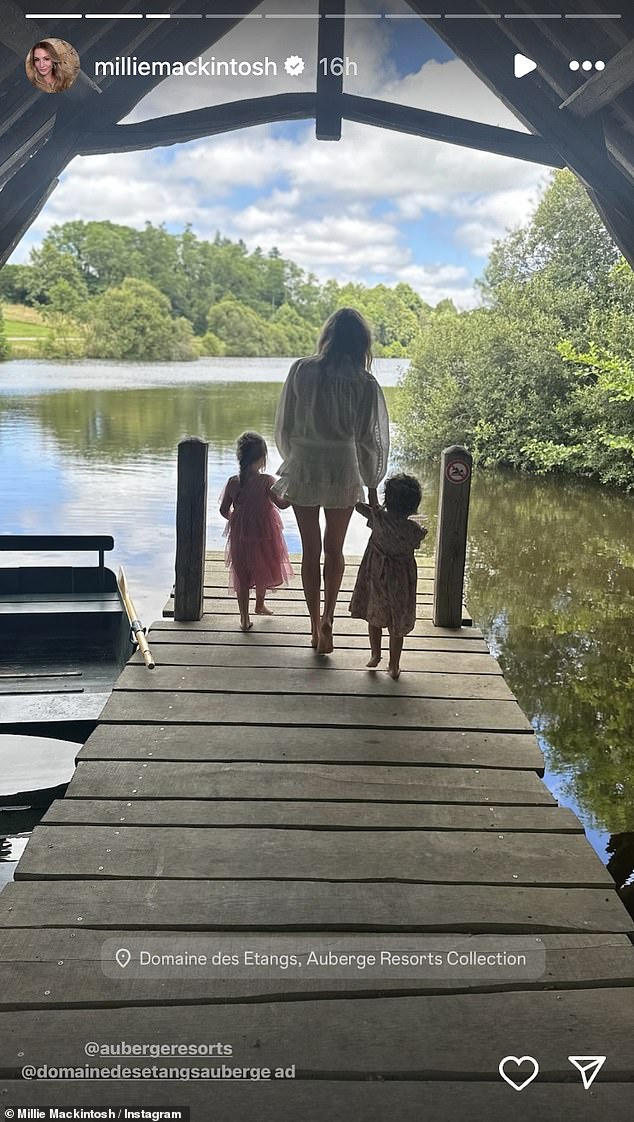 Millie stayed at Domaine des Etangs Resorts, a 5-star hotel located near the Périgord-Limousin Regional Natural Park, for a luxurious family trip (pictured with her daughters Sienna, four, and Aurelia, two).