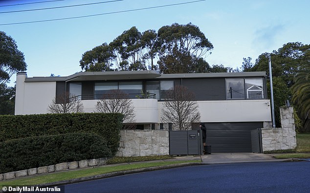 The former Melbourne Storm star and his sports presenter wife complained that the $3.7 million upgrade to the house next door would give their neighbour a direct view into their children's bedrooms.