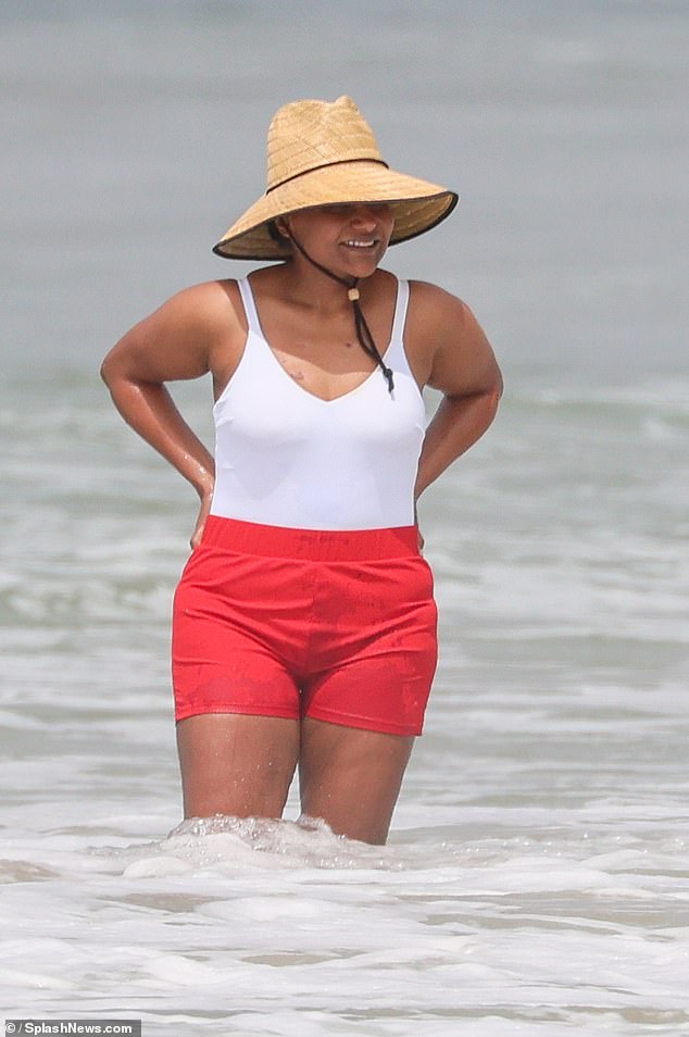 The beachy look showed off her fit physique.