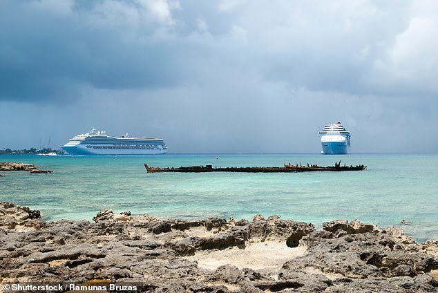 Two cruise ships near George Town on Grand Cayman Island. Cruise ship passengers outnumber residents by a ratio of 11 to 1.