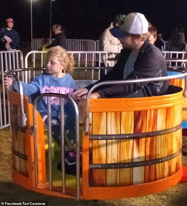 Serenity on a fairground ride with Lemons in a photo posted by her mother