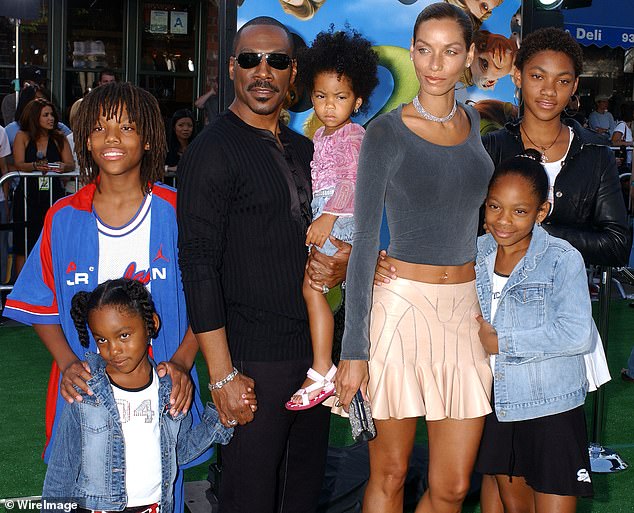 Eddie is pictured in 2004 with his then-wife Nicole and their five children Bria, 34, Myles, 31, Shayne, 29, Zola, 24, and Bella, 21.