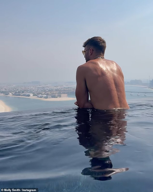 The model captured Tom as he took a dip in the infinity pool.