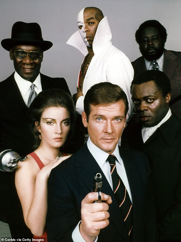 Actors Roger Moore, Yaphet Kotto, Julius W. Harris, Geoffrey Holder, Earl Jolly Brown and actress Jane Seymour on the set of 'Live and Let Die'