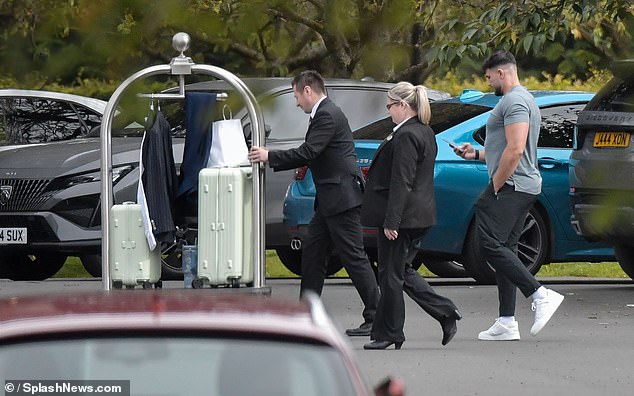 Meanwhile, her fiancé Tommy Fury, 25, watched over her luggage as she casually walked towards the hotel.