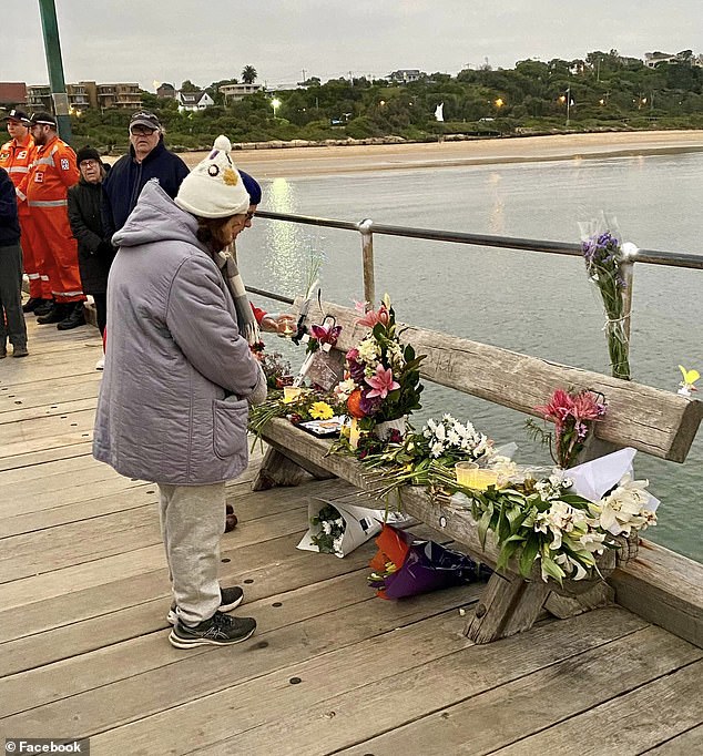 Nearly 100 people gathered for the vigil early Saturday morning.