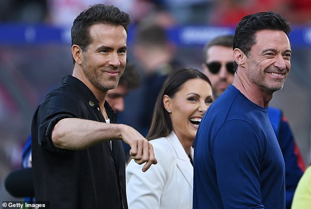 Canadian-American actor Ryan and Australian actor Hugh took a break from their promotional campaign to watch the match in Berlin.