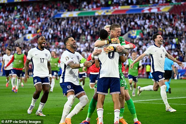 The Three Lions celebrate after winning the Euro 2024 quarter-final match between England and Switzerland at the Duesseldorf Arena in Düsseldorf today