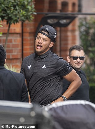 The Chiefs quarterback wore an Adidas golf shirt with his logo along with a black cap.